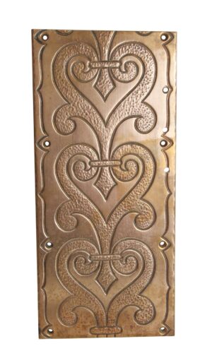 Ornate rectangular bronze wall plate with a decorative heart motif and hammered details, shown front on with mounting holes around the edges.