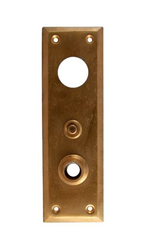 Brass door back plate with a lock hole, a doorbell button, and four mounting holes.
