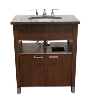 Bathroom vanity with a black granite top, integrated sink, two cabinet doors, and visible faucet hardware.