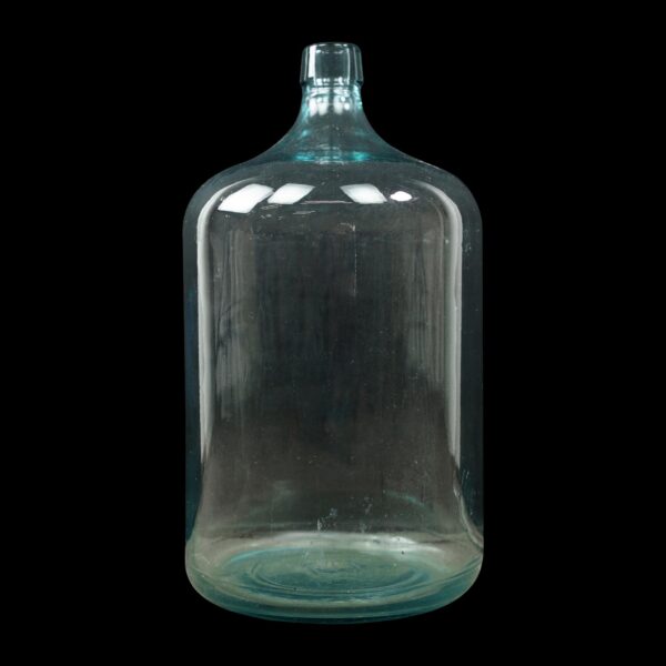 Large glass carboy bottle with a narrow neck and rounded shoulders, shown upright from the front.