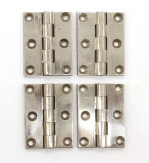 Set of four nickeled brass butt cabinet hinges with five knuckles and screw holes, shown in a front view.