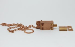 Cabinet & Furniture Latches - Brass Spring Bolt Cabinet Latch with Chain