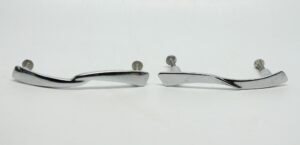 Pair of chrome bridge drawer pulls shown side by side, each with a curved streamlined handle and two screw posts.