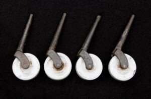 Casters - Set of Antique White Porcelain 1.625 in. Caster Wheels