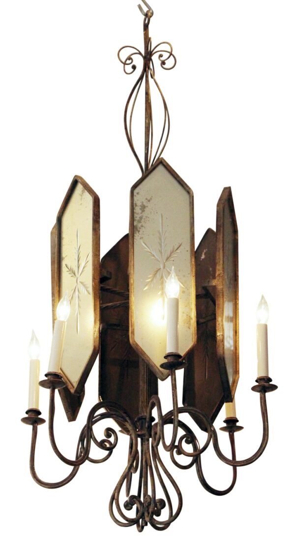 Art Deco six-arm chandelier with etched mirrored glass panels and wrought iron scrollwork, shown with candle-style bulbs.