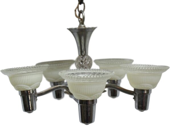 Art Deco five-arm chandelier with clear and white slip shades and a chrome-finished frame.