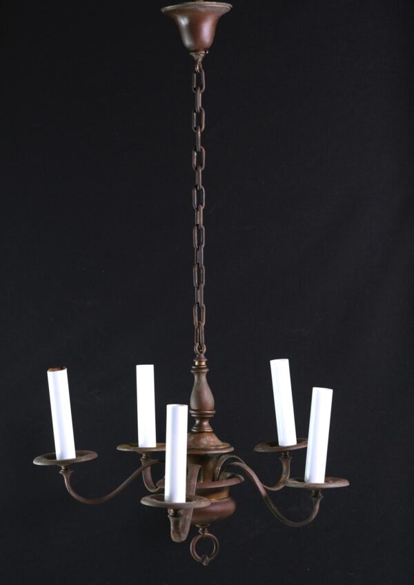 Federal-style chandelier with five scrolling arms, a chain suspension, and candlestick-style sockets.