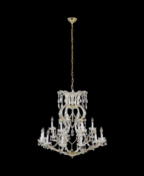 Marie Therese chandelier with six arms and eighteen candle-style lights, an open crystal-draped frame, and an antique brass finish.