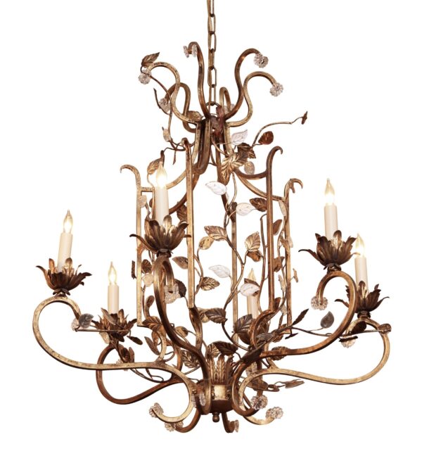 Six-arm chandelier with curled wrought iron arms, floral details, and crystal leaves, shown with candle-style bulbs in a gold finish.