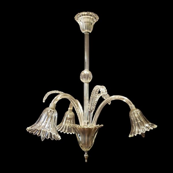 Three-arm clear glass chandelier with a ribbed central stem, three upward-curving leaf accents, bell-shaped shades, and a tapered lower basin.