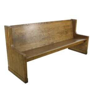 Oak bench with a high back and armrests, shown in a three-quarter view with a dark wood tone and visible surface wear.