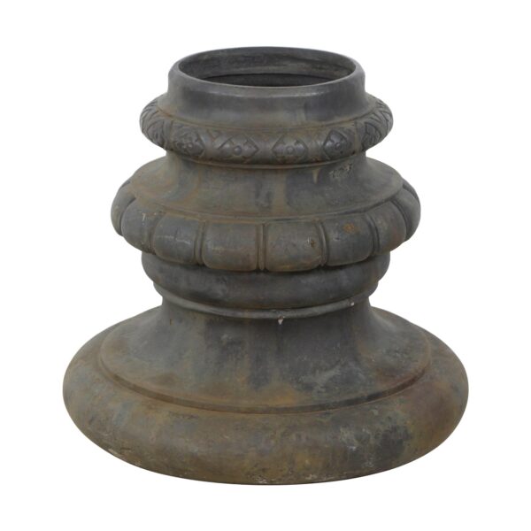 Antique ornate bronze hollow base with carved band detail and visible wear.