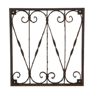 Antique wrought iron panel with a solid frame, curling scrollwork, and visible rust from age and use.
