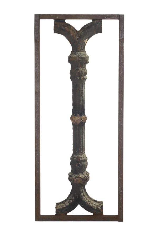 Cast iron baluster wall panel with a rectangular frame and decorative central spindle, shown vertically with a rusted black finish.