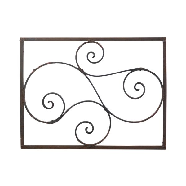 Wrought iron gate panel with curled spiral details inside a rectangular frame.