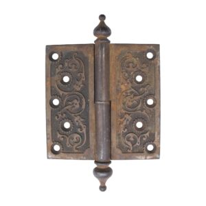 Victorian cast iron butt door hinge with steeple tips, two knuckles, and a staggered hole pattern shown front on.