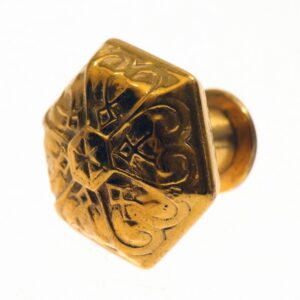 Antique bronze hexagon door knob with vernacular engraved detailing, shown in close-up from the front.
