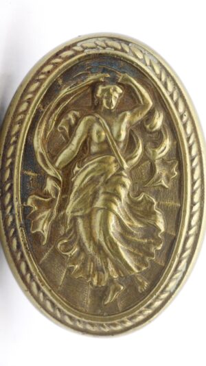 Antique bronze oval door knob with a raised goddess figure and rope-edge border.