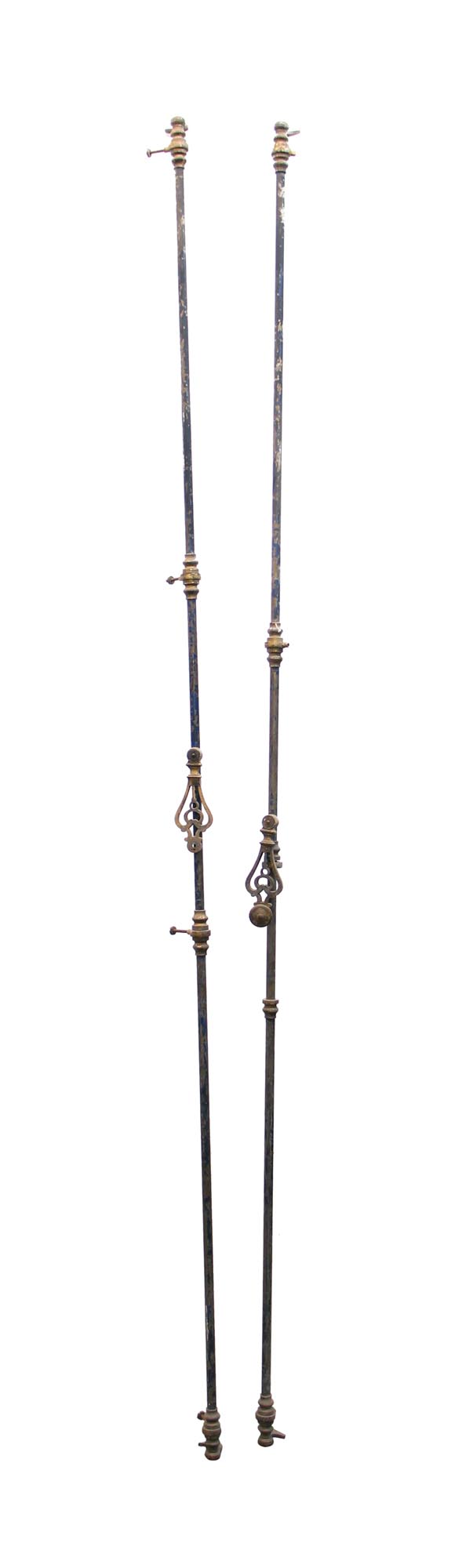 Pair of black brass cremone bolts shown side by side, each with decorative handle details and long vertical rods.