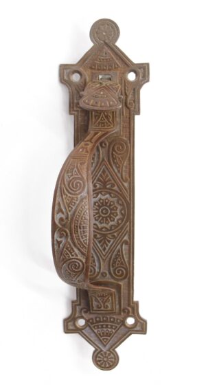 Ornate left-hand door pull with thumb latch, shown front view with decorative Aesthetic-style backplate and four screw holes.