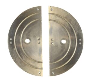Pair of round brass push back plates shown side by side, each with a center knob hole and mounting holes, with a half-circle edge on the inner side.
