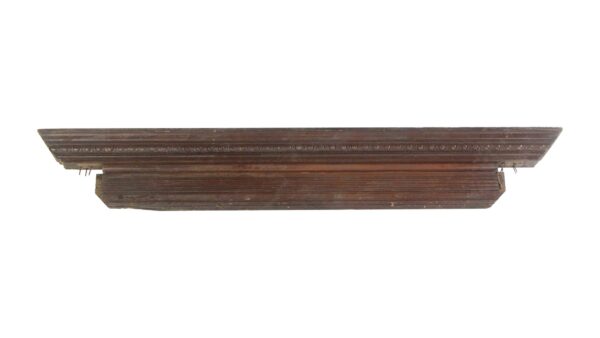 Solid carved mahogany door header with egg and dart detail shown in a wide front view.