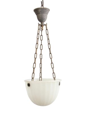 Pendant light with a fluted white milk glass bowl suspended by three chains and an antique brass fixture top.