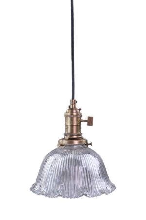 Pendant light with a clear prism glass shade, antique brass fixture, and black knit cord.