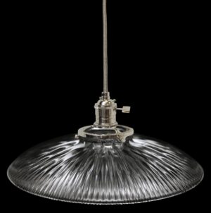 Clear glass pendant light with a ribbed globe shade and metal fitter hanging from a braided cord.