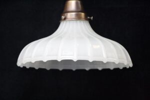 Fluted white glass pendant light shade with a metal fitter at the top.