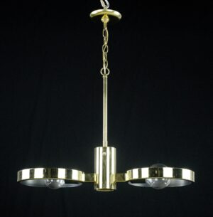 Mid century modern pendant light with two circular arms and a polished brass finish, shown hanging with a central stem and chain.