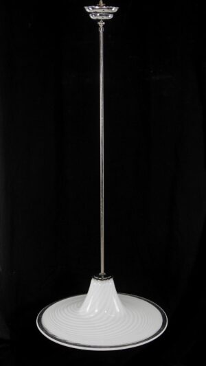 Pendant light with a hand blown white and clear glass shade, a subtle swirled pattern, and a polished nickel pole.
