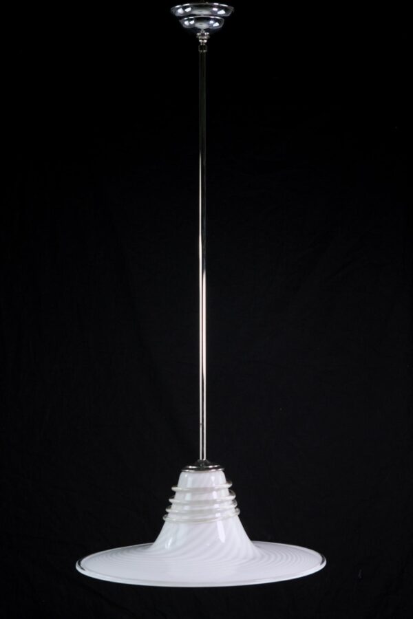 Pendant light with a white hand-blown glass shade, clear glass coil, and a long polished nickel pole, shown against a plain background.