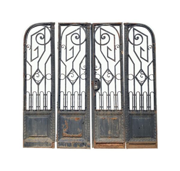 Art Nouveau wrought iron bifold doors with decorative scrollwork, four panels, and lower solid sections shown front view.