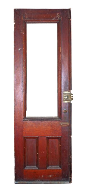 Antique half glass entry door with one tall opening and two lower panels, shown without the missing glass pane.