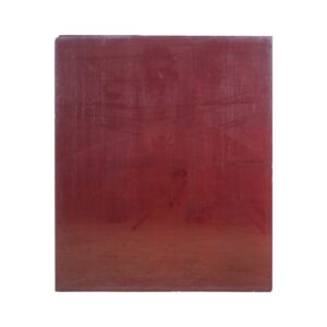 Red glass sheet with a rectangular shape, showing a small broken corner and minor edge chips.