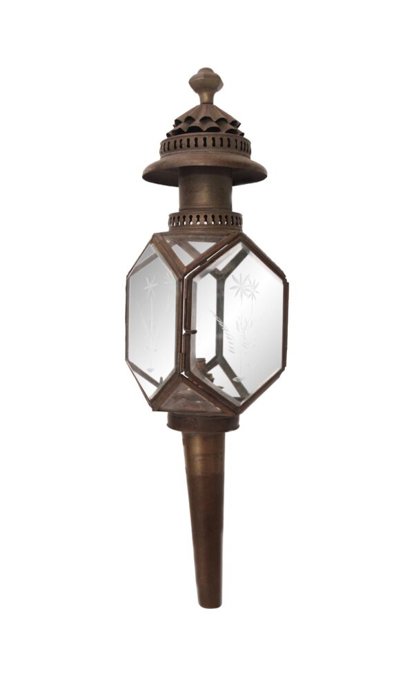 Victorian exterior carriage lantern with brass housing, etched glass panels, and a pointed mounting stem.