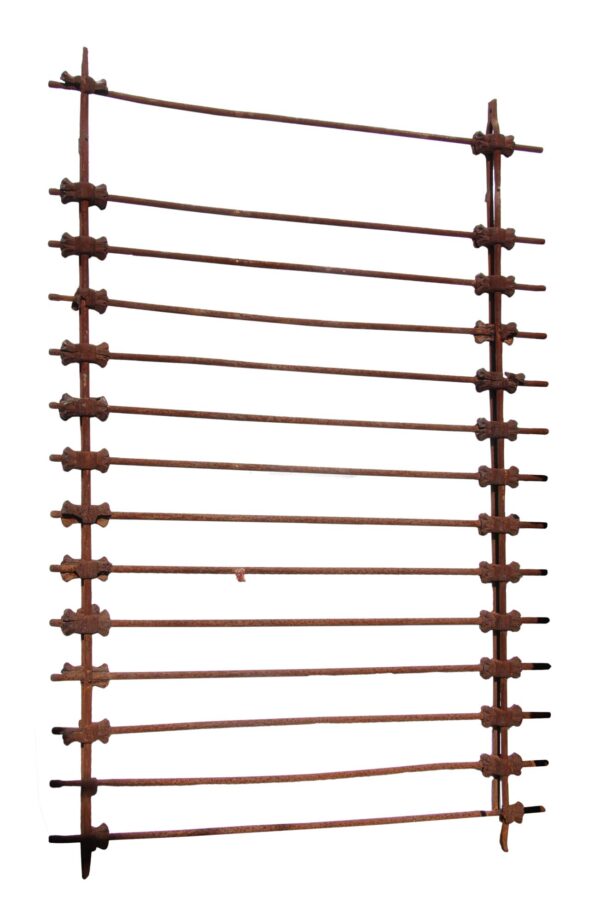 Wrought iron fence panel with floral castings and evenly spaced horizontal bars.