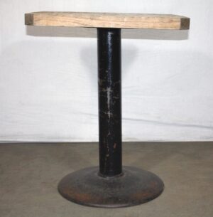 Bistro cafe table with a light wood tone butcher block top and a cast iron base, shown in a centered front view.