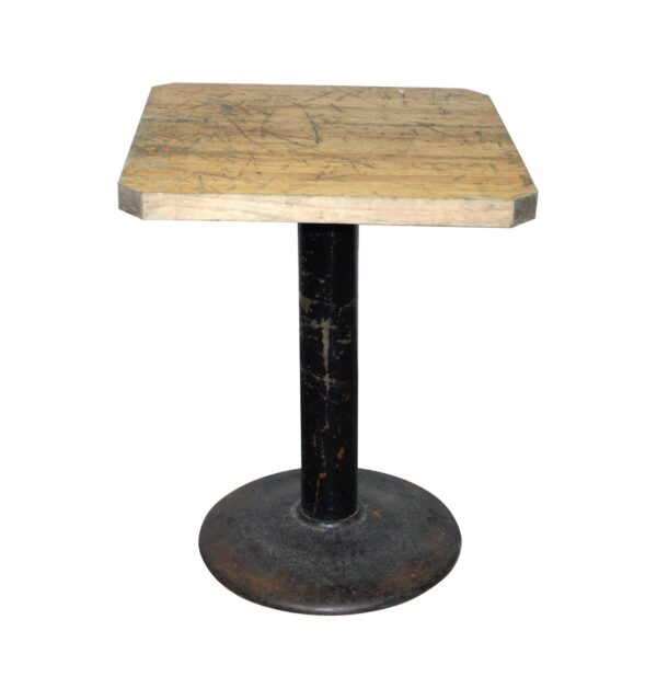 Bistro cafe table with a light wood butcher block top and a cast iron pedestal base, shown in a straight-on view.