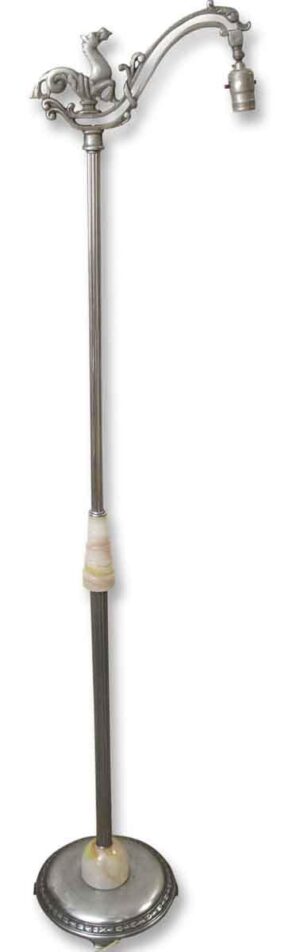 Antique floor lamp with a horse motif at the top, visible marble details on the shaft and base, and a hanging socket.