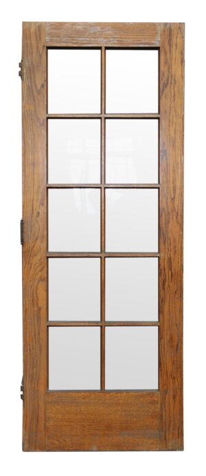 Medium wood tone French door with 10 glass panes and a solid lower panel, shown front view.