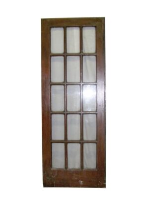 A dark wood tone door with 15 glass panels arranged in a grid.