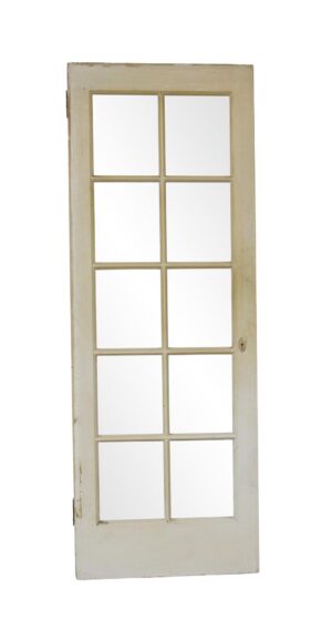 White painted French door with 10 square glass lites and a visible knob hole, shown in a straight-on view.