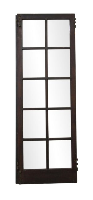 Dark wood tone French door with 10 glass panes and an attached lip, shown vertically.