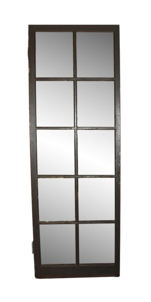 Dark wood tone French passage door with 10 glass panes, shown upright in full view.