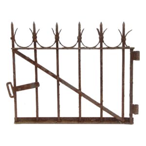 Antique wrought iron gate with intact latch and finial details, shown front view with heavy rust patina.
