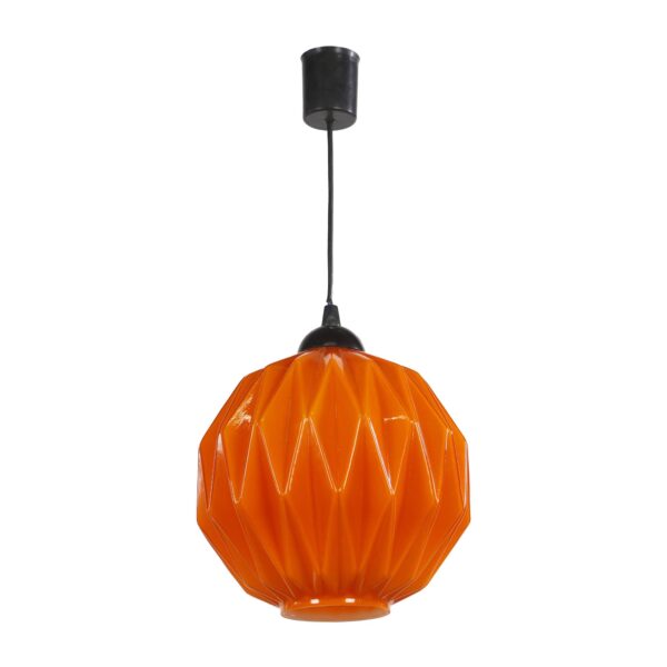 Pendant light with an orange geometric glass shade and a black cord.