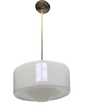 Mid century pendant light with a white milk glass globe and long antique brass pole fitter.