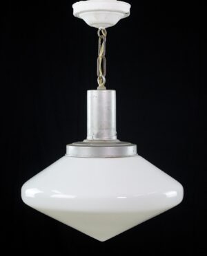 Mid-century modern pendant light with a white milk glass saucer shade and aluminum canopy, shown hanging front view against a dark background.